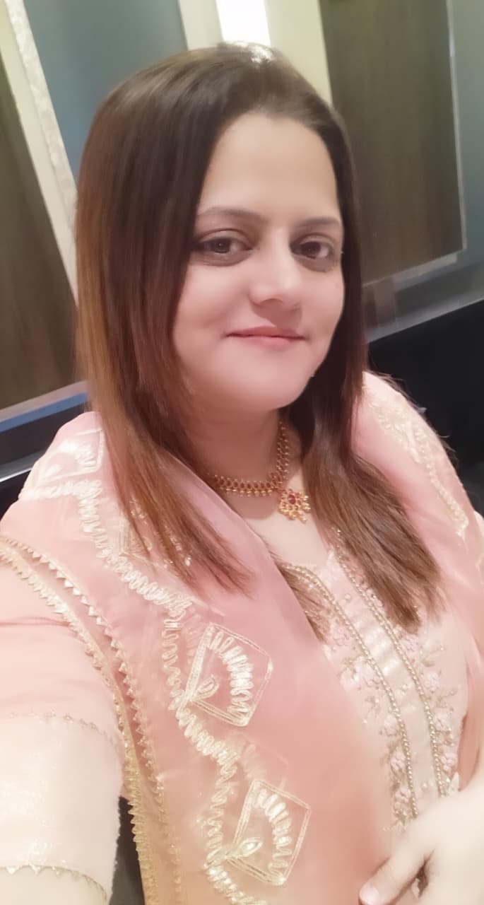 Poonam Apte recording at a studio microphone